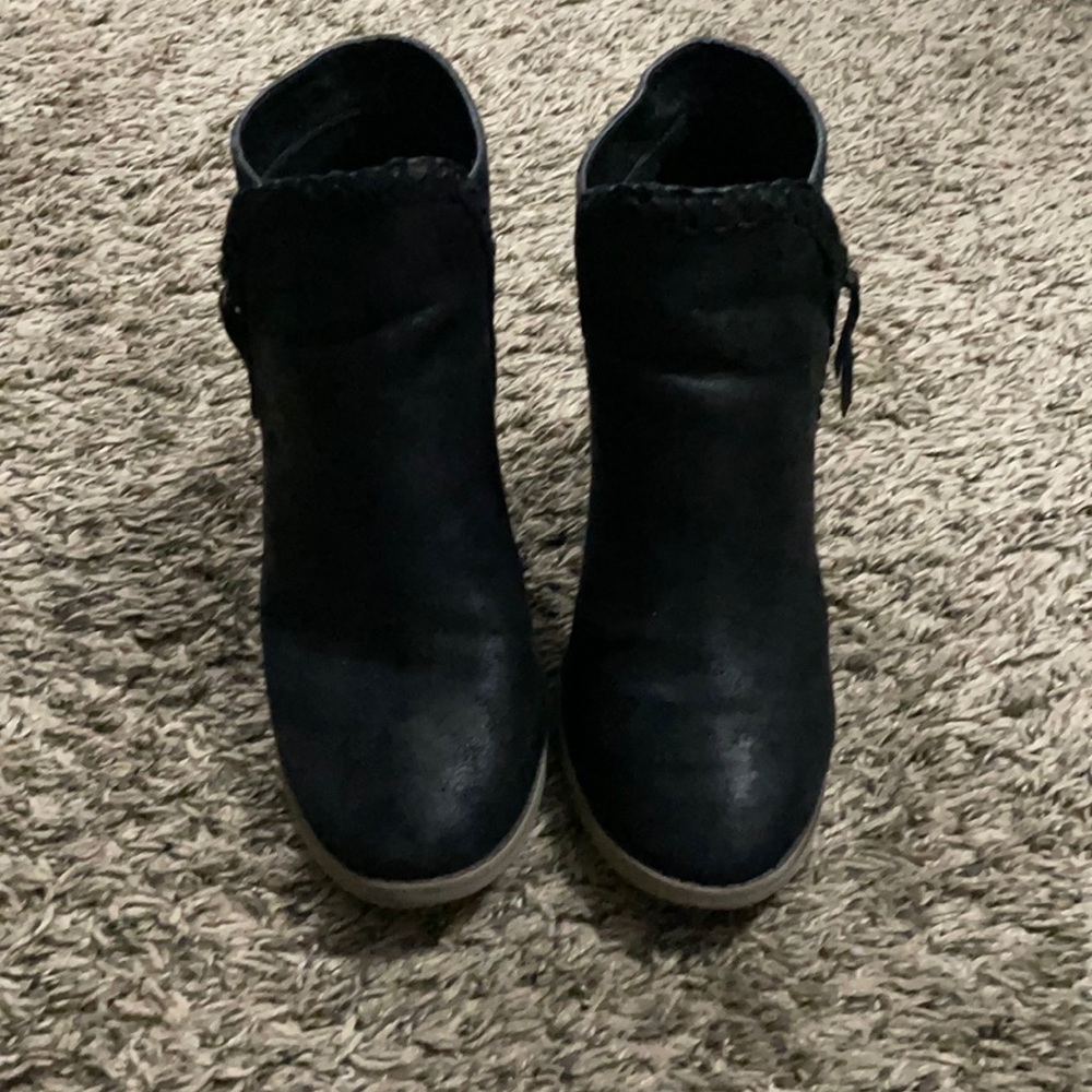 Maurice’s black booties.